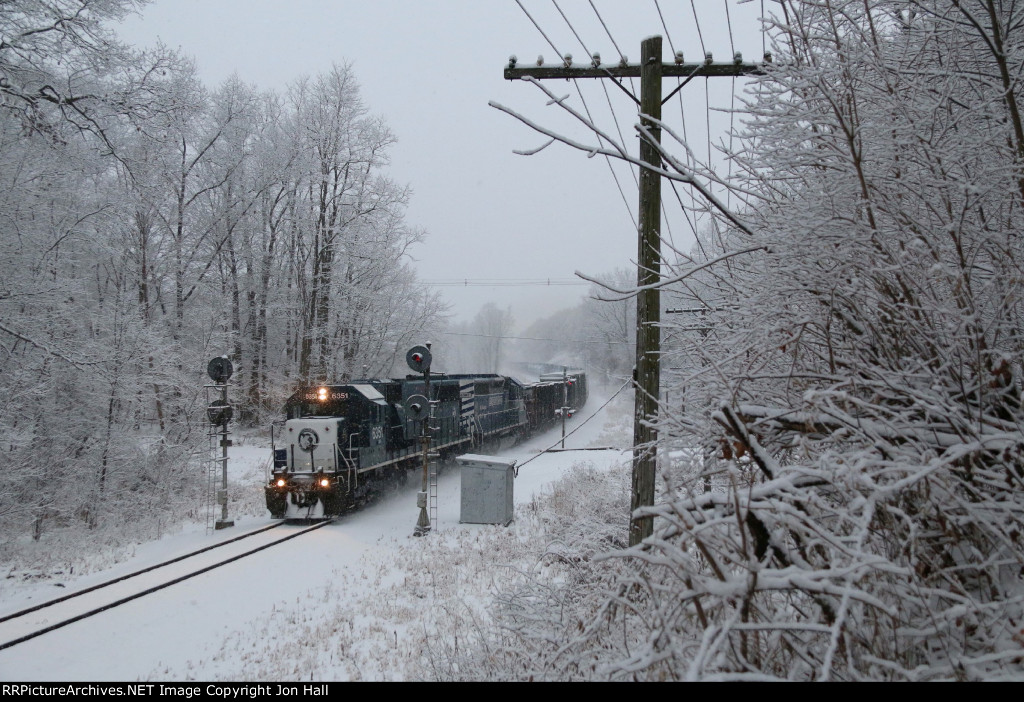 With the overnight snowfall coating everything, 6351 splits the Munger Rd signals leading Z127 south